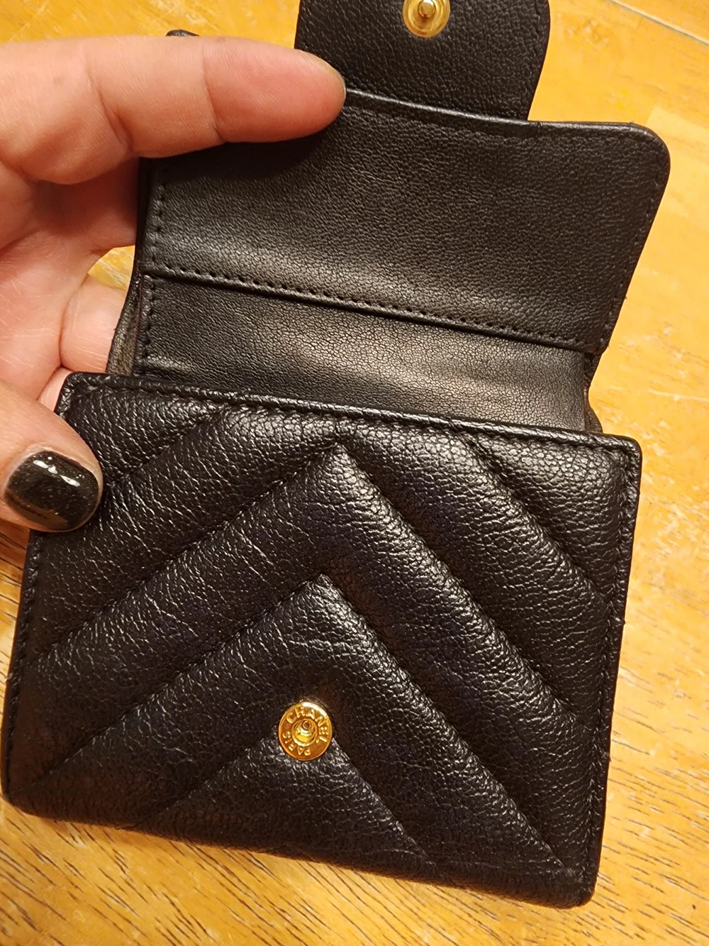 black quilted leather Chanel 2.55 Reissue compact wallet